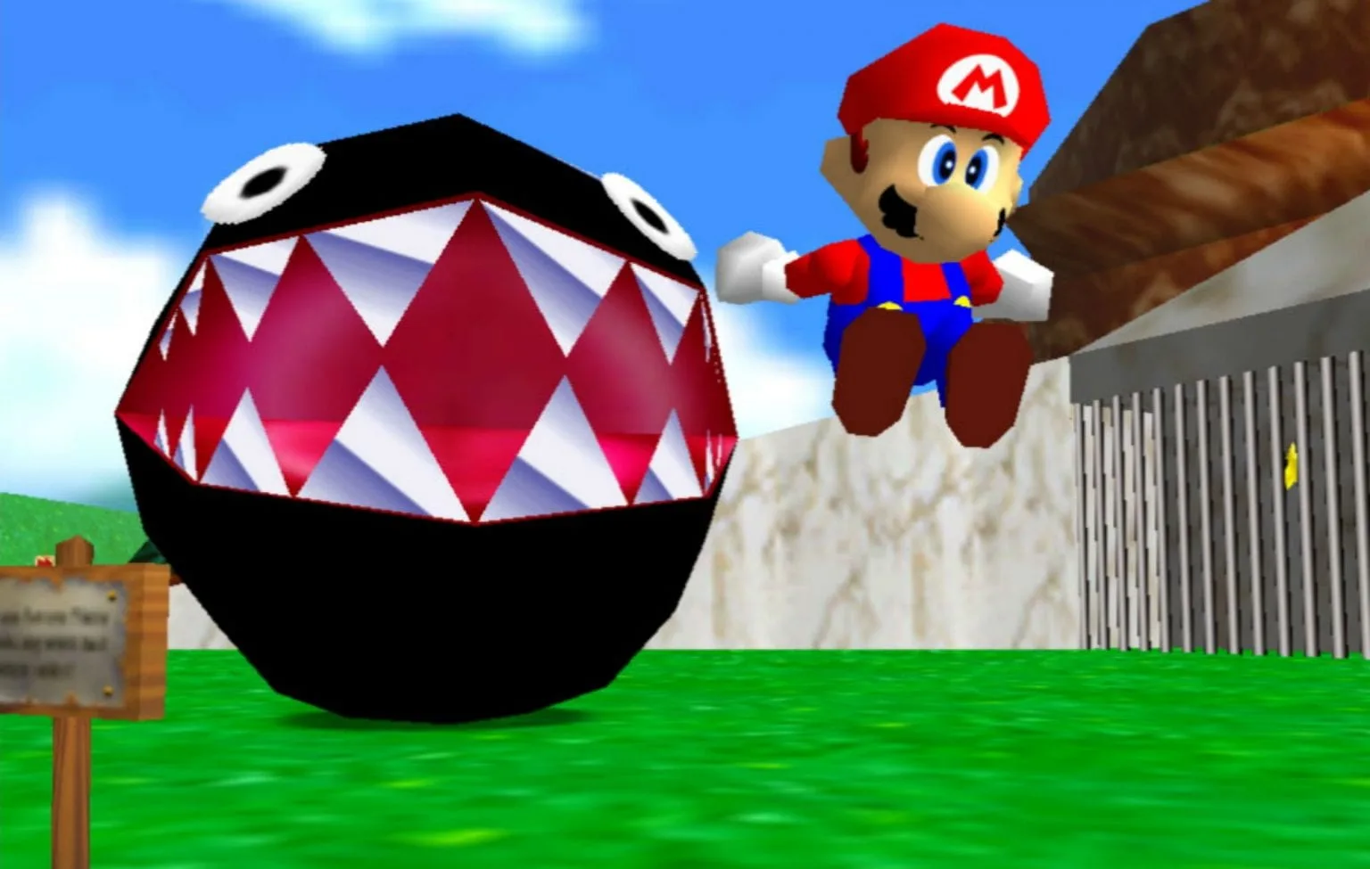 Super Mario 64 - Mario jumping away from the big chain chomp