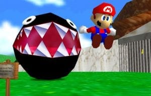 Super Mario 64 - Mario jumping away from the big chain chomp