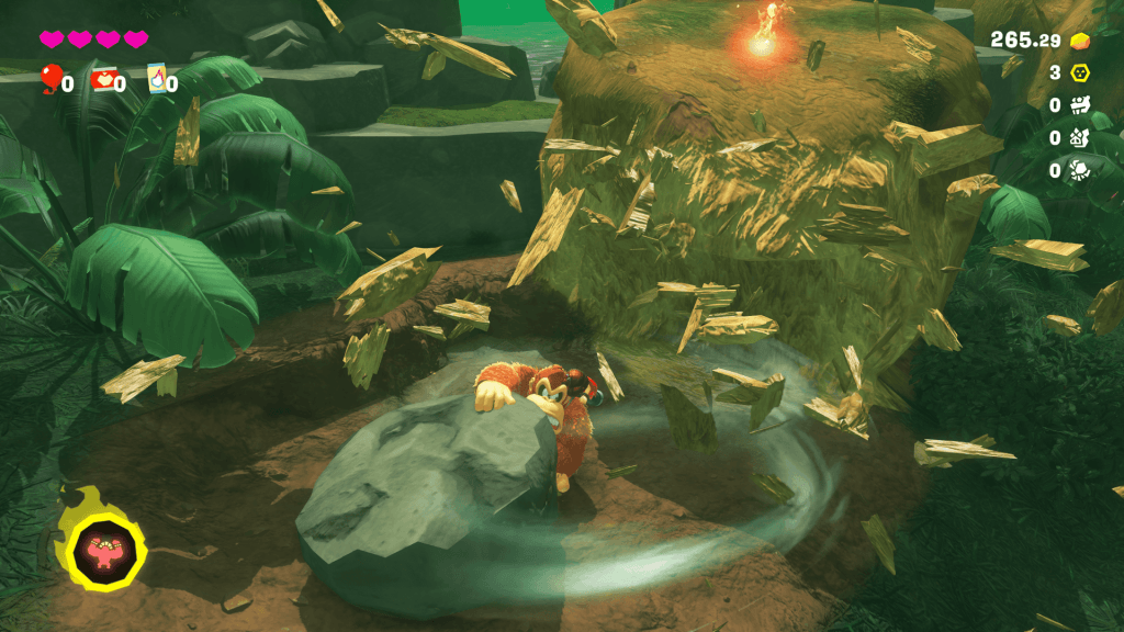 Donkey Kong Bananza Review - screenshot of DK smashing terrain with a rock