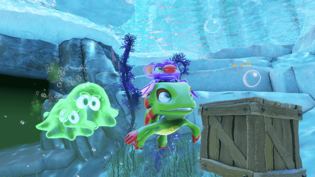 Yooka-Replaylee Review - a picture of the protagonists swimming underwater