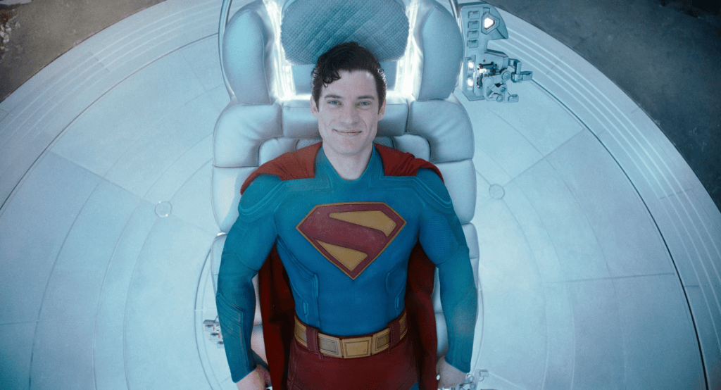 A screenshot from the 2025 Superman film of Superman smiling at the camera.