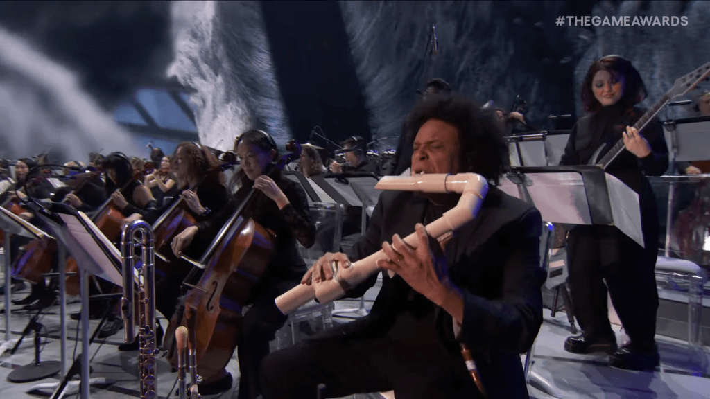 The Game Awards 2025 Orchestra - Pedro Eustache ("Flute Guy") playing a white pipe