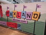 Screenshot of a sign at PAX East 2026, saying "PAXLAND, Welcome Home"