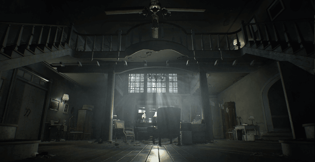 Resident Evil 7 Review - screenshot of a large, elaborate entryway, with staircases on either side of the room and light seeming through a central window