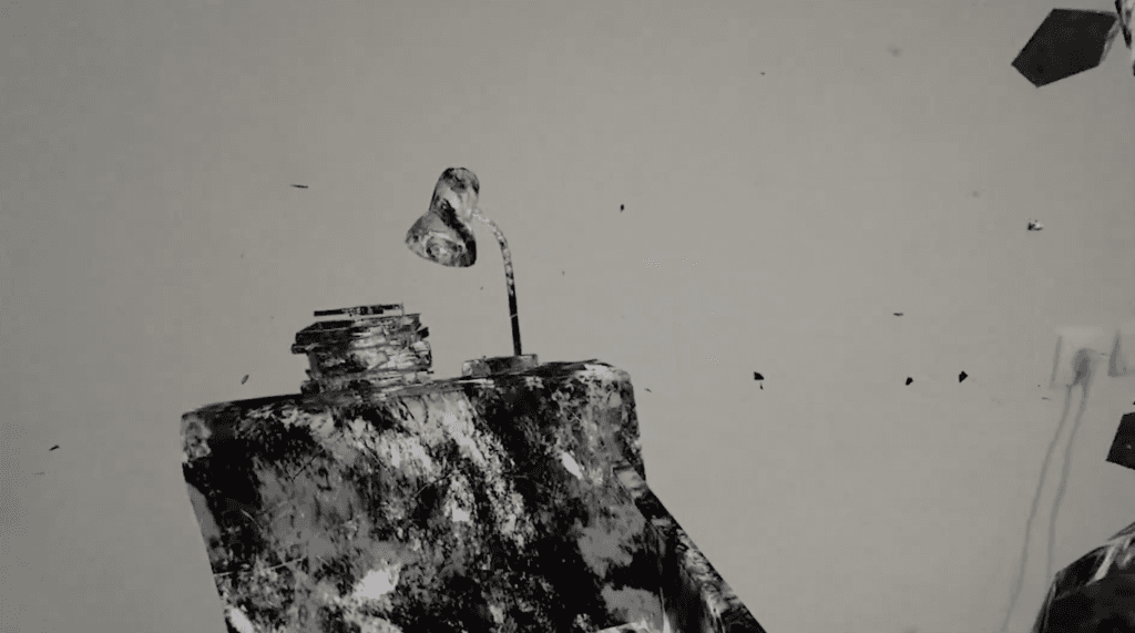 A screenshot of an armchair with books and a lamp but with strange colors from a VR experience called Lionia is Leaving at SXSW 2026. 