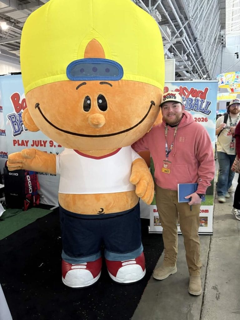 The Punished Backlog writer Zack Gulinello posing for a picture Pablo Sanchez from Backyard Baseball