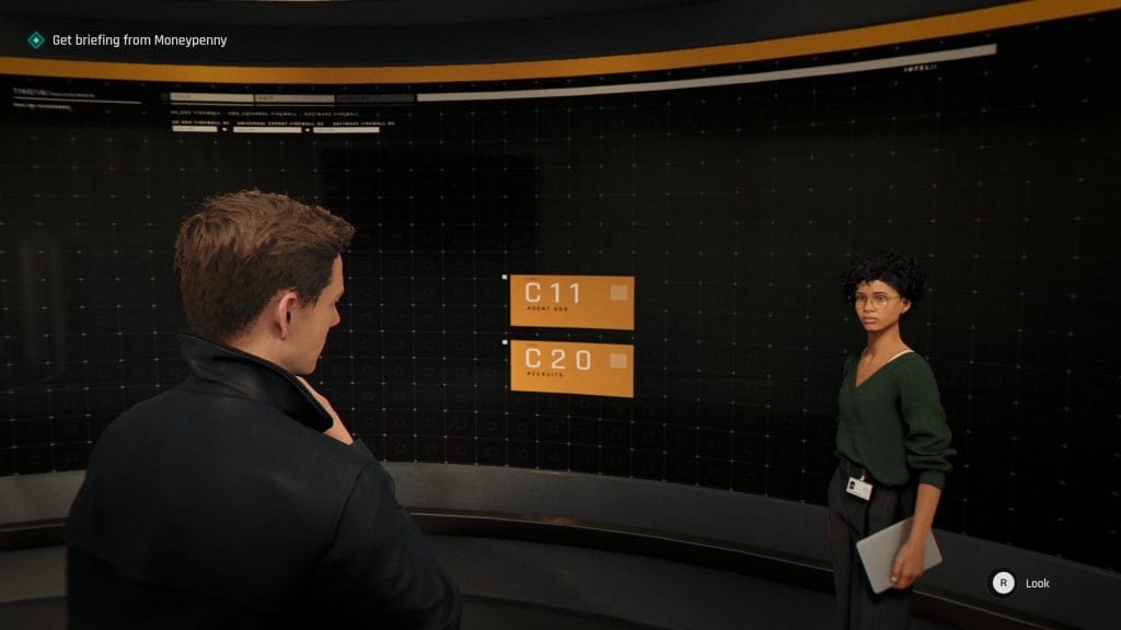 A screenshot from 007 First Light (2026, IO Interactive) showing James Bond talking to Moneypenny in front of a large touch screen for a mission briefing. This image is featured in a piece analyzing the role of Moneypenny in James Bond films, books,and video games.