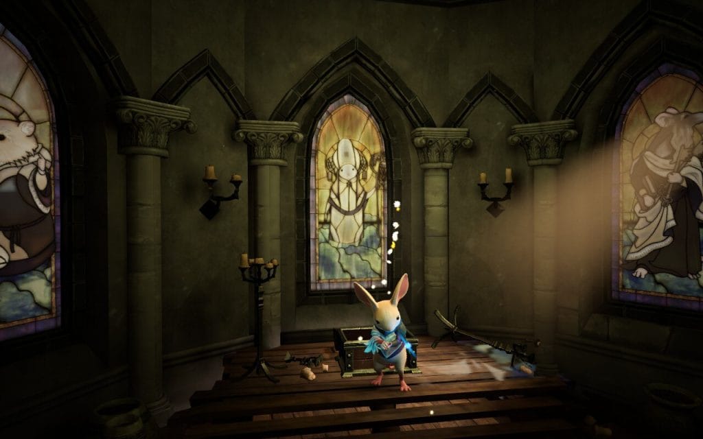 Moss: The Forgotten Relic - a screenshot for a review showing Quill, a mouse, standing in a mice church with stained glass windows behind her.