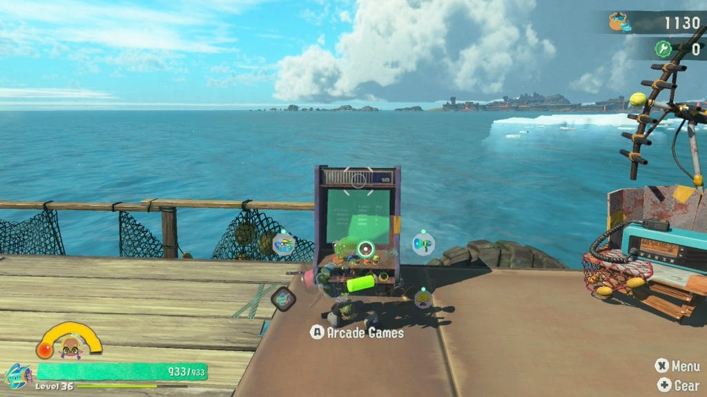 Splatoon Raiders - screenshot of "the mechanic" protagonist standing in front of an arcade machine at the Hideout Ship