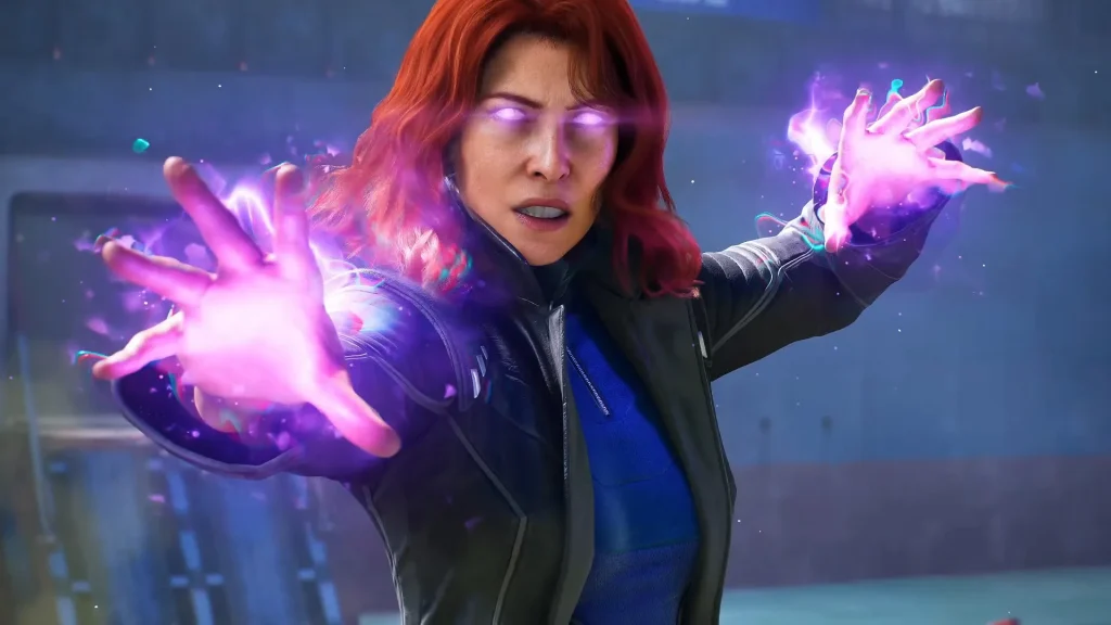 A promotional screenshot of Marvel's Wolverine, developed by Insomniac Games and published by Sony Interactive Entertainment. In this screenshot, Jean Grey -- a woman with red hair wearing a leather jacket -- prepares her powers as her hands and eyes glow purple.