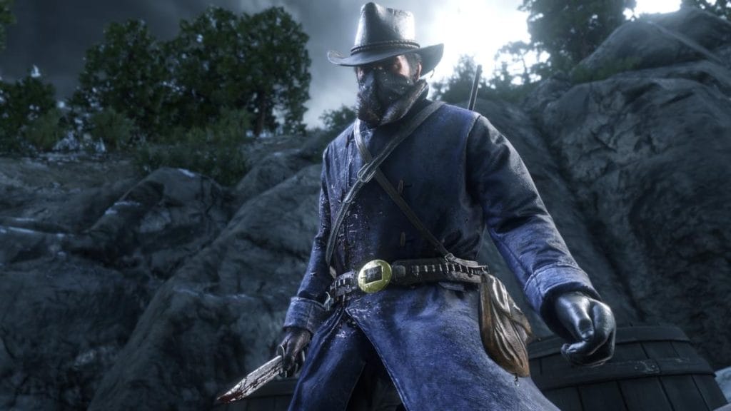 Red Dead Redemption 2 - Arthur Morgan wearing a bandana over his face and holding a bloody knife