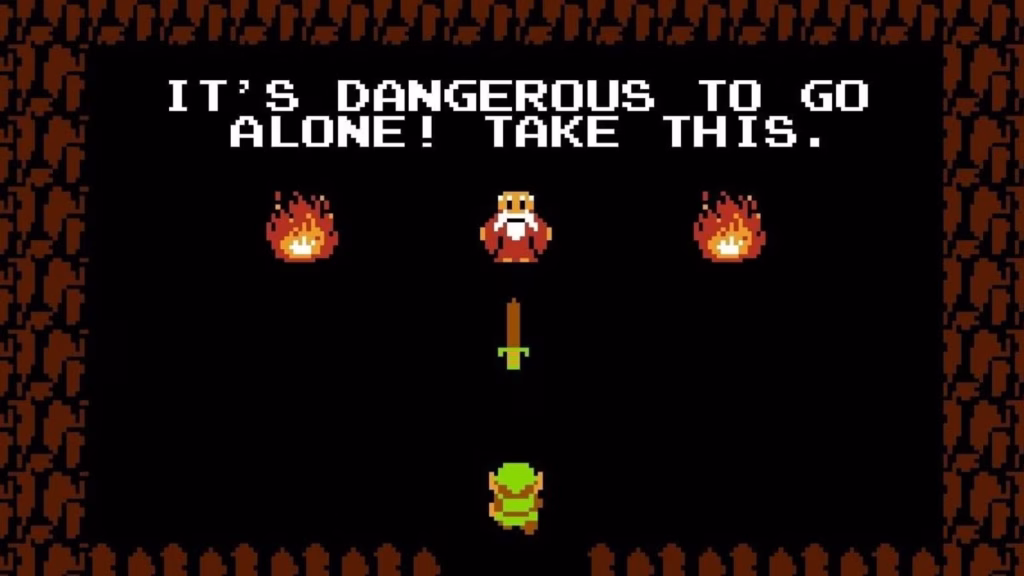 The Legend of Zelda (NES) - Old man in cave near start of the game saying, "It's dangerous to go alone! Take this." while giving link his first sword.