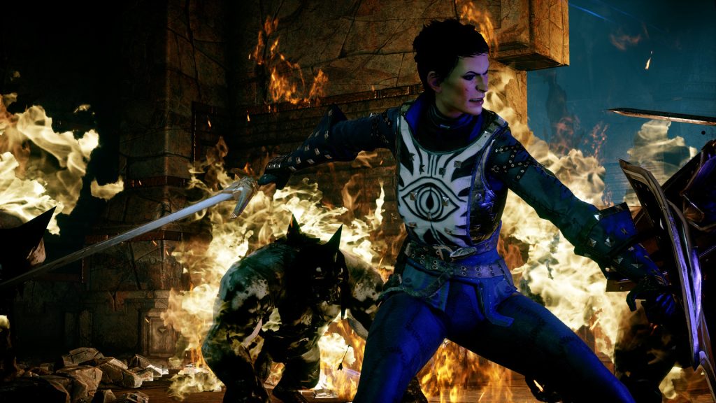A screenshot of Dragon Age Inquisition showing Cassandra fighting enemies in front of fire. This screenshot is featured in an op-ed about why the shut-down of BioWare is so sad and bad for the games industry.
