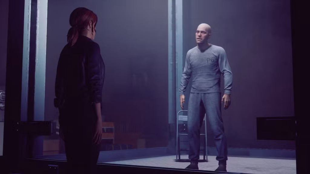 Control: A screenshot of Jesse Faden talking to Dylan Faden, a prisoner, in the first game. 